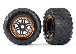 Traxxas 8972T MAXX MT Tires On Black Wheels Orange Beadlock Rings (2pcs)